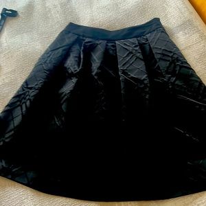 Gorgeous skirt with the bow on the back.  brand new!